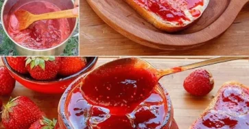 Tarro de mermelada de fresa casera sobre mesa de madera
